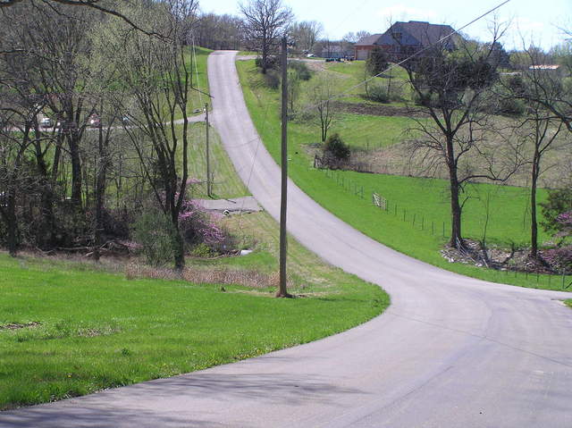 Nearest road to the confluence:  Looking west from the driveway of 130 Spring Creek Road.