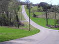 #5: Nearest road to the confluence:  Looking west from the driveway of 130 Spring Creek Road.
