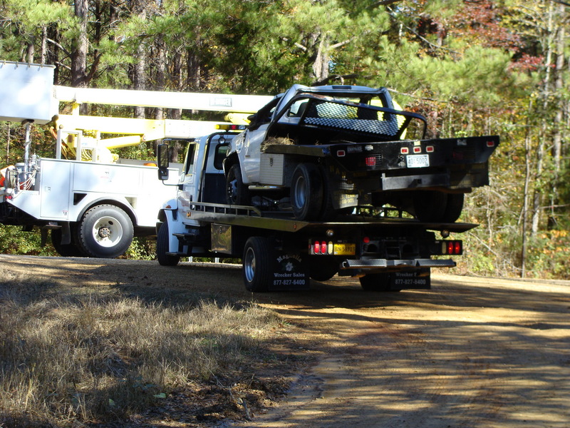 The damaged vehicle being towed from the intersection of Enon and Childs roads.