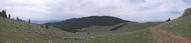 #6: Panorama of the approach route. Confluence is low on ridge across valley.