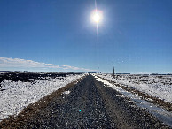 #8: Looking south down the road along which we parked, 500 meters west of 47N 97W