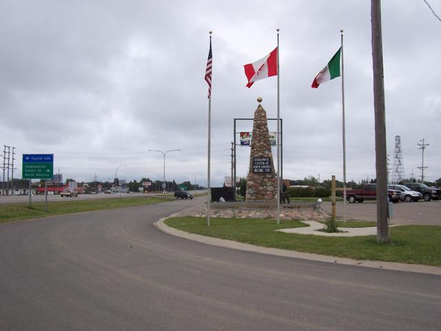 View of the cairn looking East along Highway 2 and the service road.