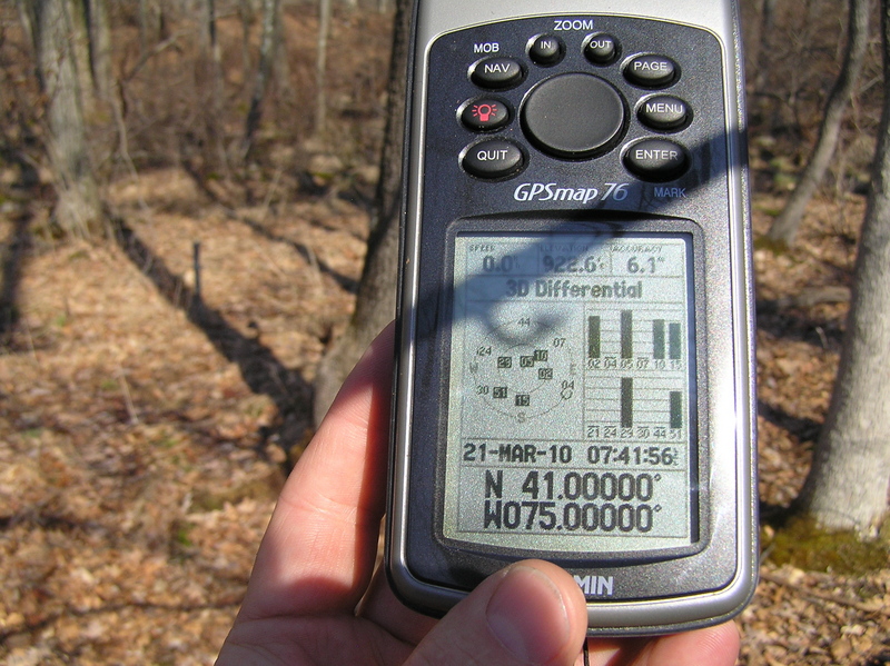GPS reading at the confluence point after a difficult confluence dance.