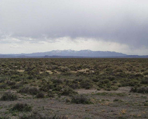 Looking SSW past Mud Lake to (L to R) Cole, Banner, and Kendall Mountains. Goldfield is on the other side.