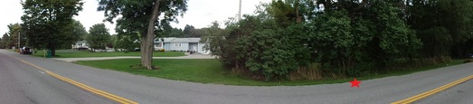 #1: Panoramic view from the west side of the road. CP is marked by the red star.