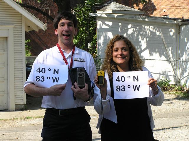 Geographers Joseph Kerski and Anita Palmer conducting field work in the alley.