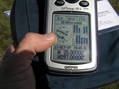 #2: GPS reading at the confluence in the bright sunlight.