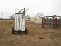 #4: Farm equipment with the owner's house in the background