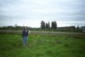#3: Looking east across I-5; Suzanne is holding a map