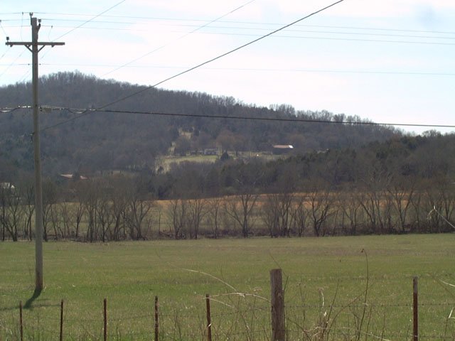 The house and the hill that overlook the confluence area