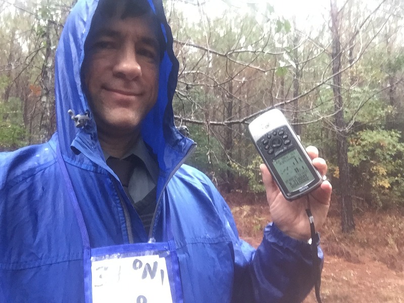 A very wet Joseph Kerski at the confluence site.