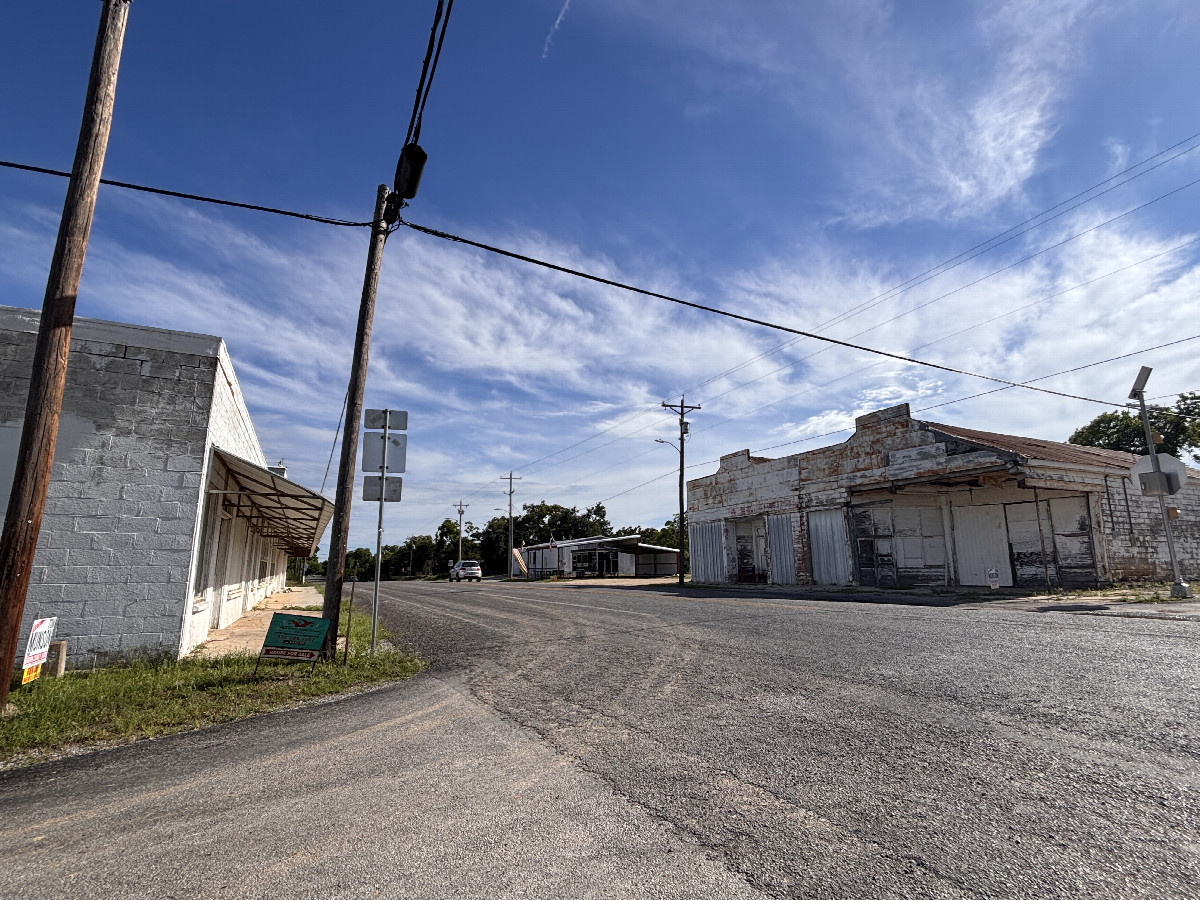 May, Texas, about 4.75 miles southeast of the confluence.