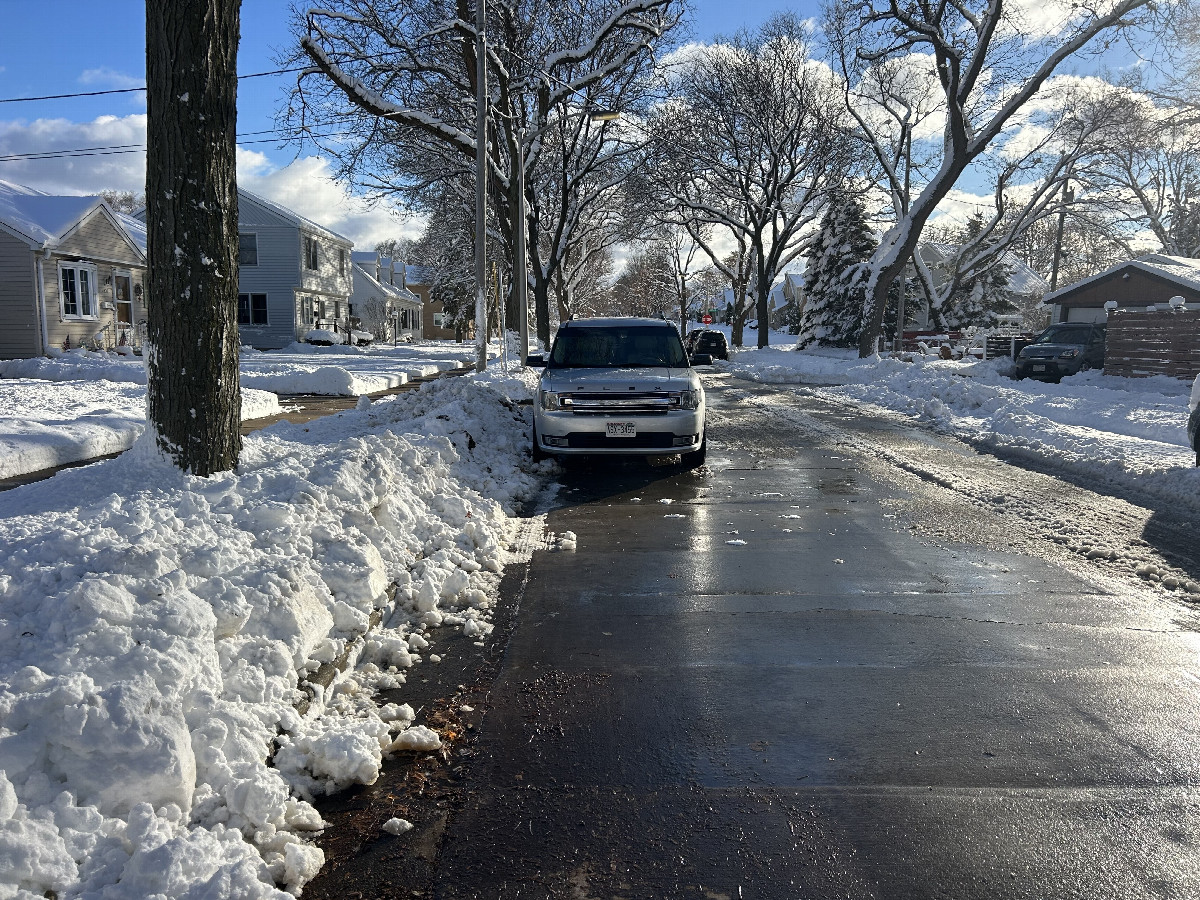 A view to the south from the confluence, down 70th St toward Arthur Ave.