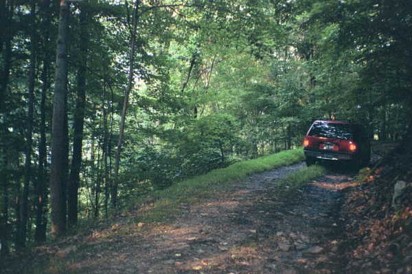 The narrow dirt road running just to the south of the confluence