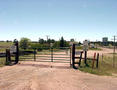 #4: The gate blocking the dirt road along the Union Pacific railroad tracks.