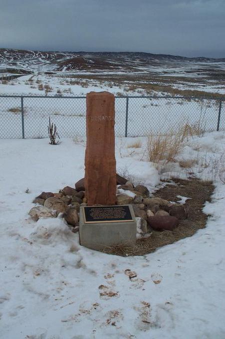 Nearby monument marks the border corner